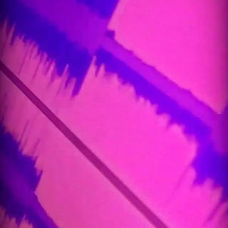 A picture of audio waveforms with a pink filter on it.